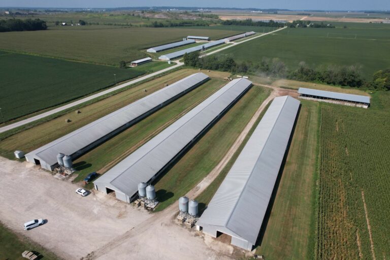 Aerial view of RL Wilson farm, showing extensive hail storm damage, expertly handled by Premier Claims throughout the claims process.